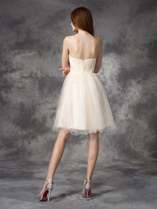 A-Line/Princess Sweetheart Homecoming Dresses Brittany Applique Sleeveless Short Net Dresses