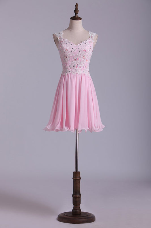 2024 Straps A-Line/Princess Homecoming Dresses Chiffon With Applique